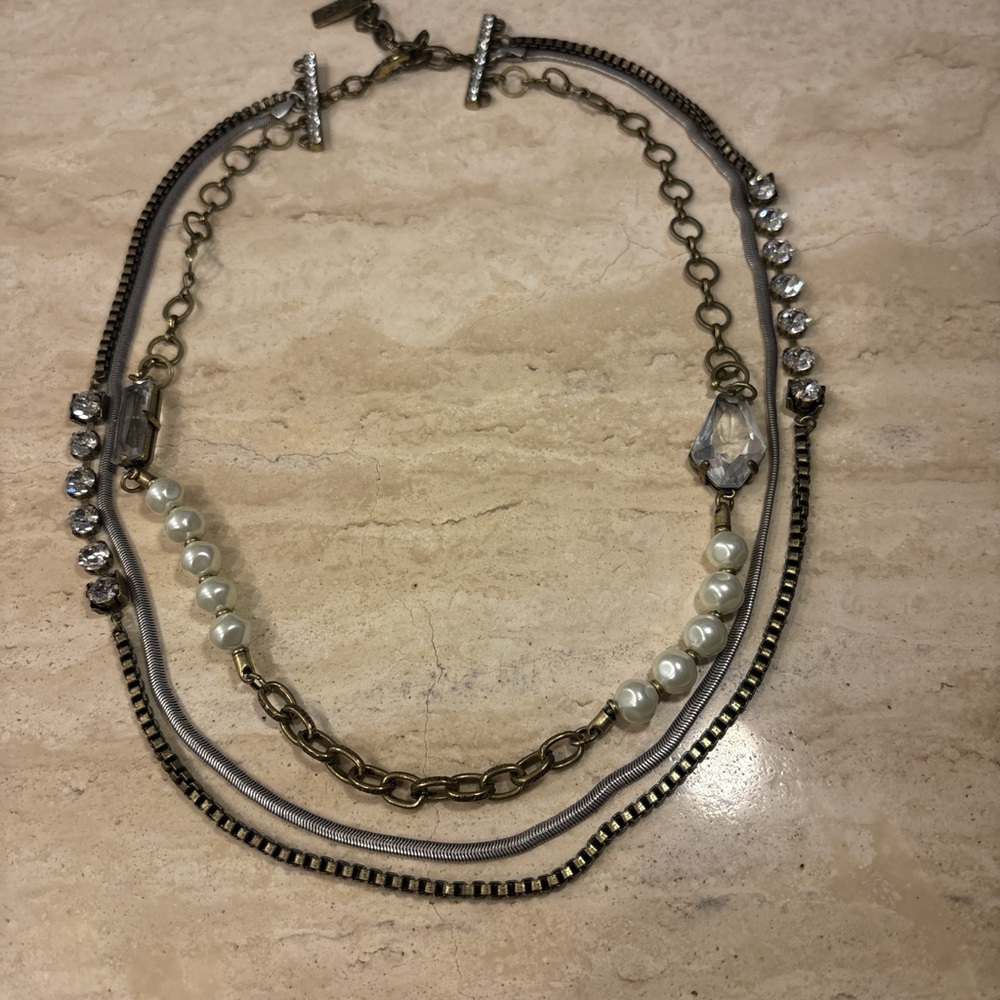 Elegant Multi-Layered Gold and Silver Necklace